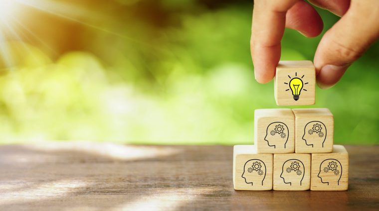 brainstorming-creative-idea-innovative-idea-concept-hand-picked-wooden-cube-block