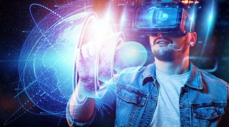 The man holds on his hand a hologram of the earth, the internal structure, the structure of the nucleus. Earth geology concept, new technologies.